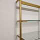 Modular shelf in glass and gilded aluminum from the 70-80s