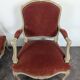 Paire de fauteuils cabriolets rouges de style Louis XV