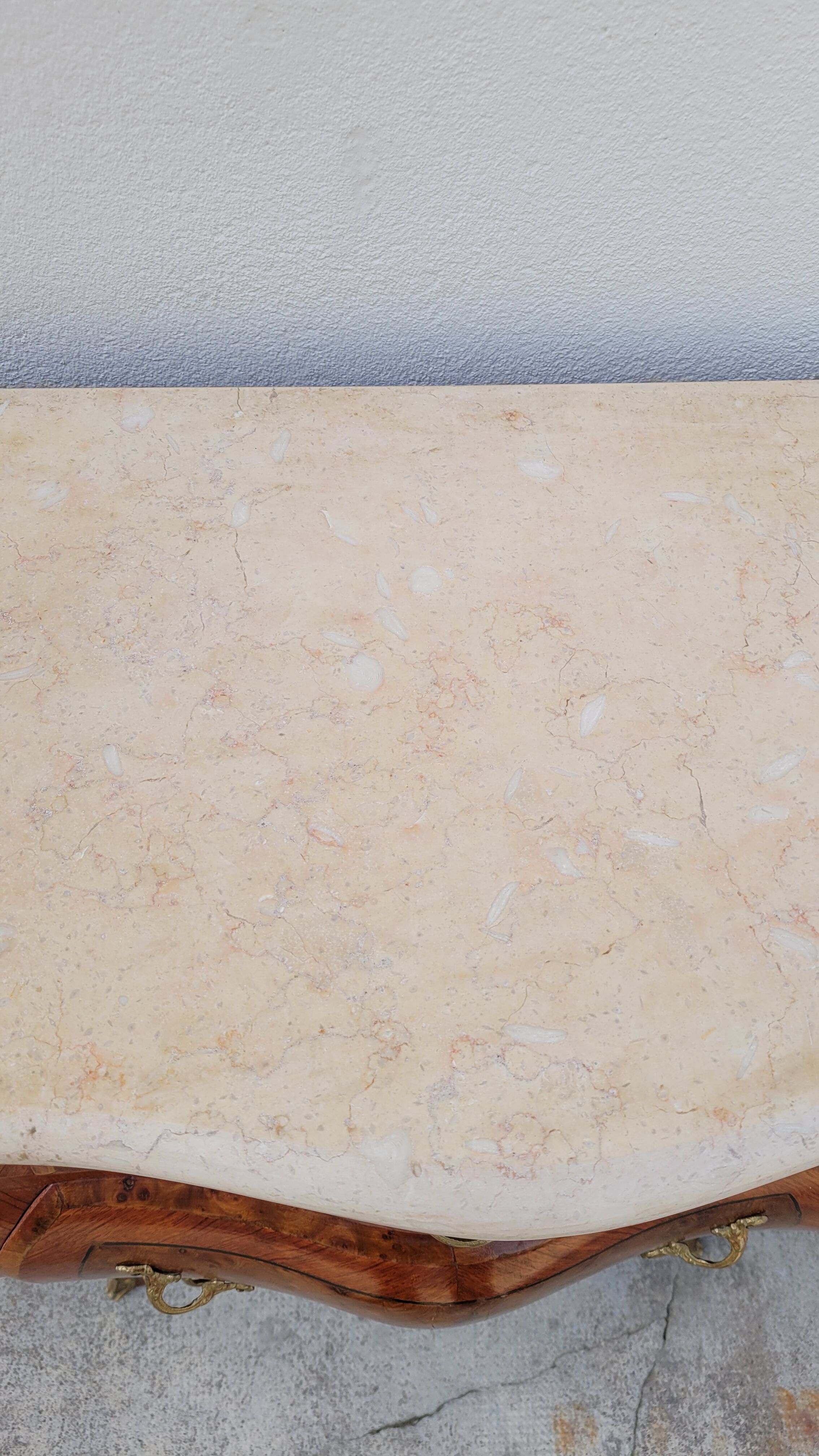 Louis XV style curved chest of drawers in marquetry