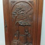 Ancienne porte en bois chêne sculpté