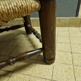 Charles Dudouyt (1885-1946) - Low chair in turned wood and straw - 1940