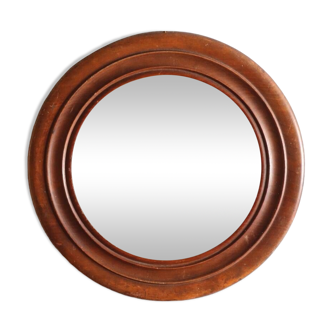 Round old wooden mirror