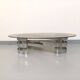 Vintage oval coffee table in smoked glass and chrome metal from the 1970s.