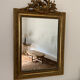 Mirror with molded pediment in Louis XVI style
