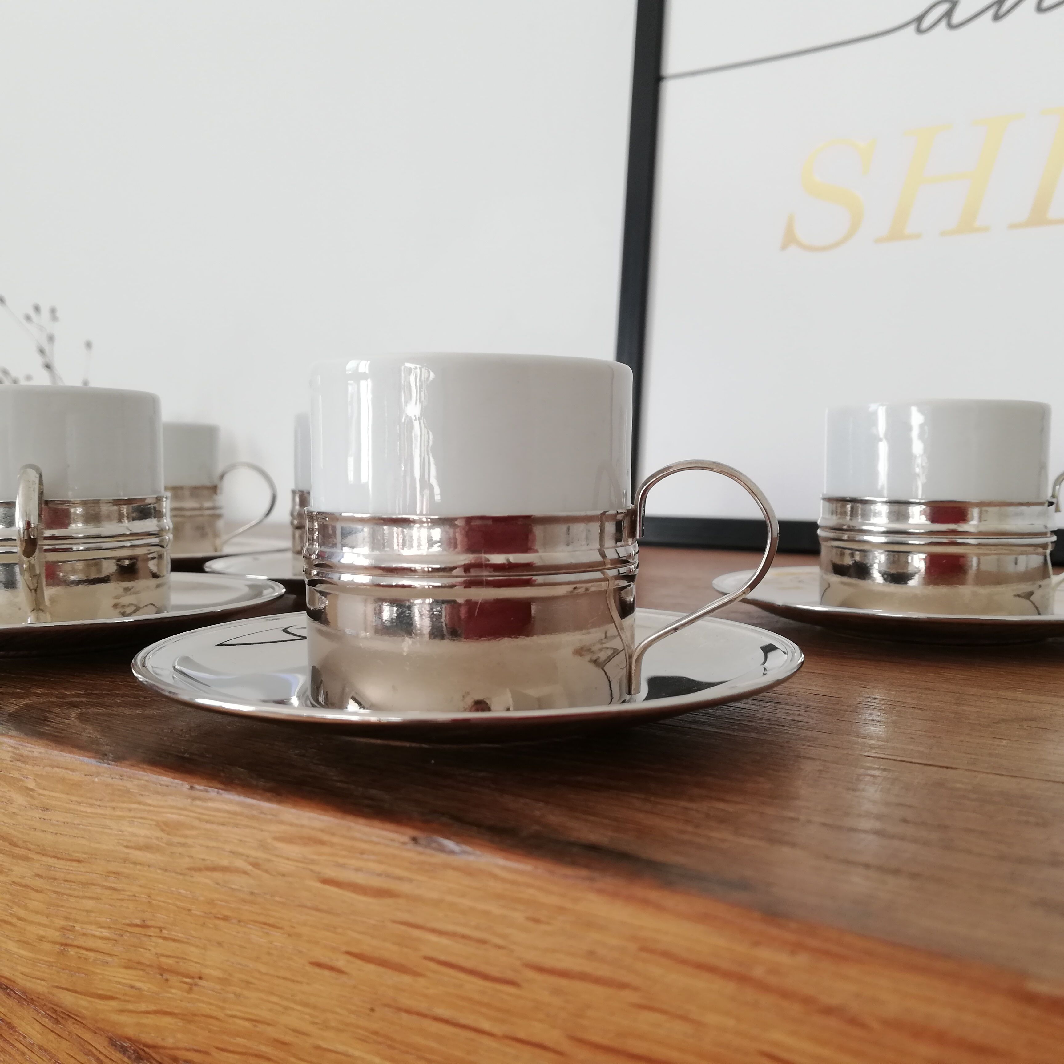 6 ceramic and metal coffee cups