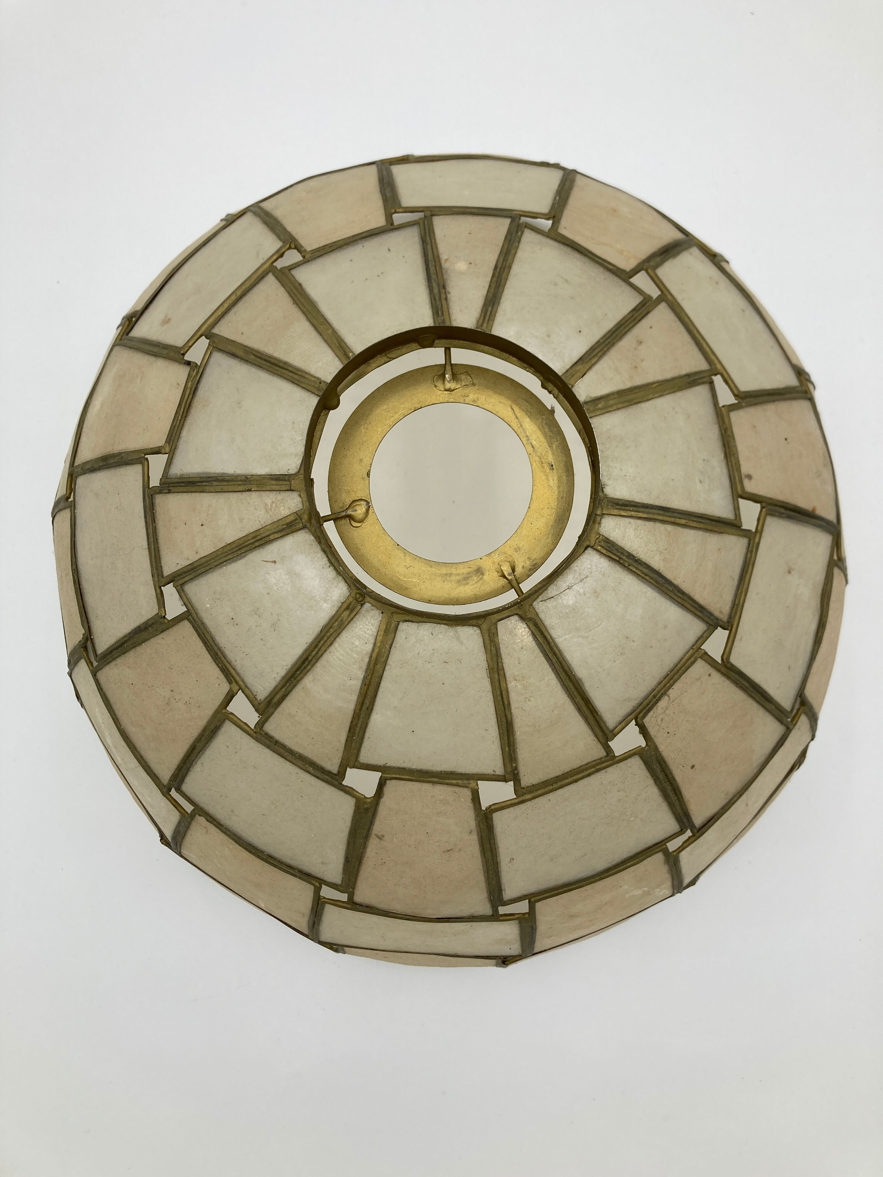 Suspension in geometric mother-of-pearl