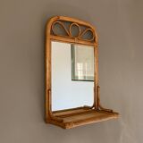 Arched rattan mirror with shelf. 1960.
