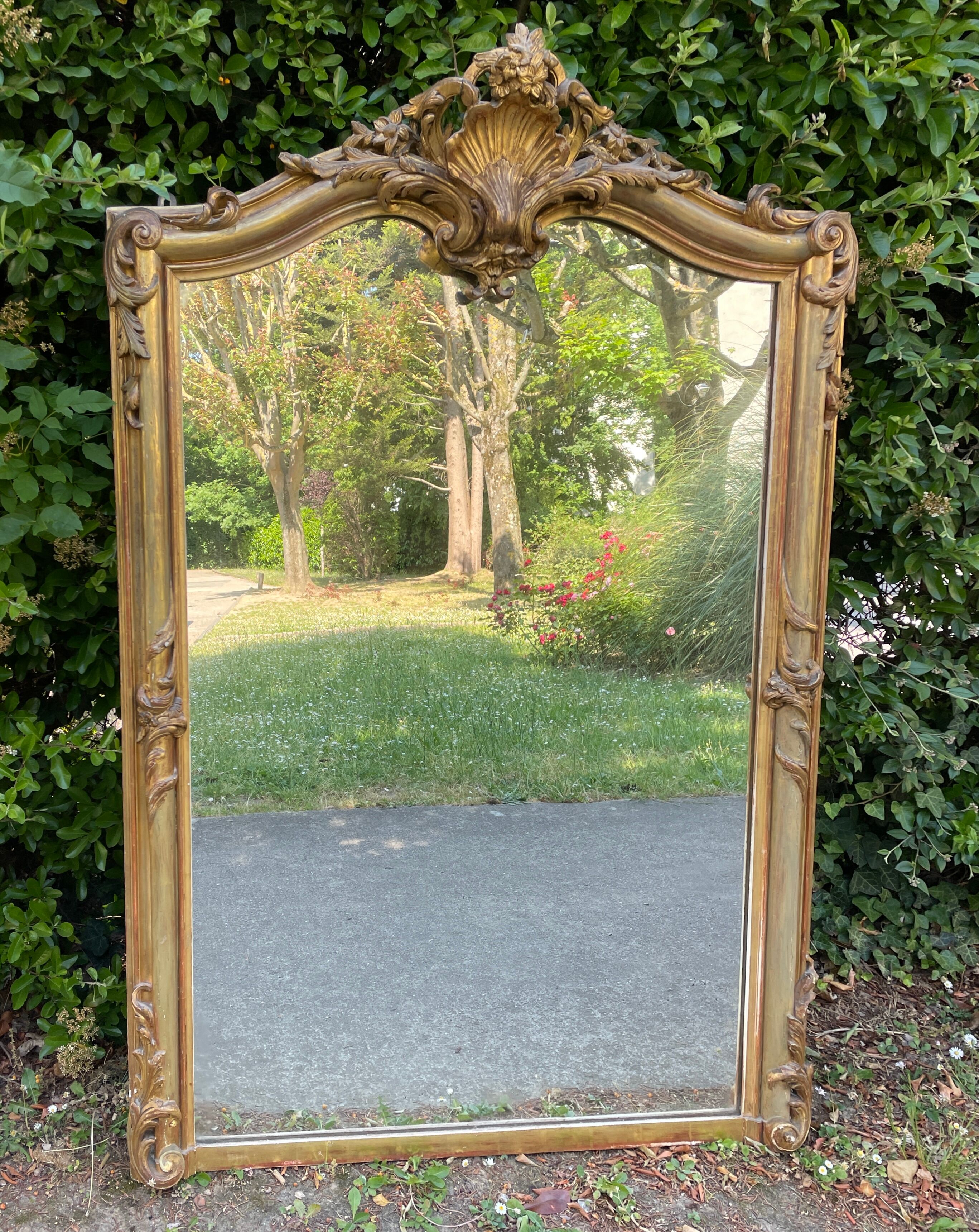 Old Louis XV style mirror in wood and gilded stucco. Napoleon III