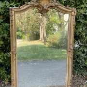 Old Louis XV style mirror in wood and gilded stucco. Napoleon III