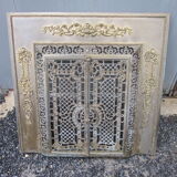 Front of the old fireplace all in bronze