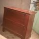 Small Louis Philippe chest of drawers with cut corners.