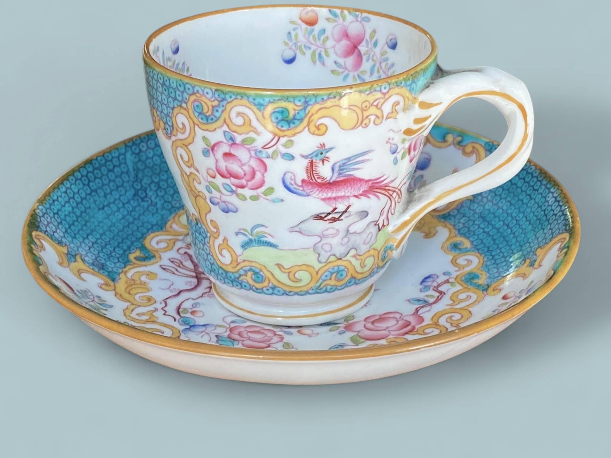 English porcelain coffee cup and saucer Minton 4910 blue bird design