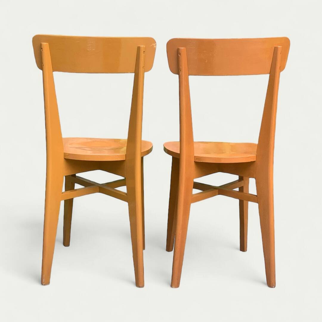 Pair of caramel bistro chairs 1950