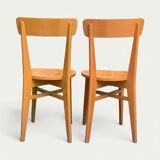 Paire de chaises bistrot caramel 1950