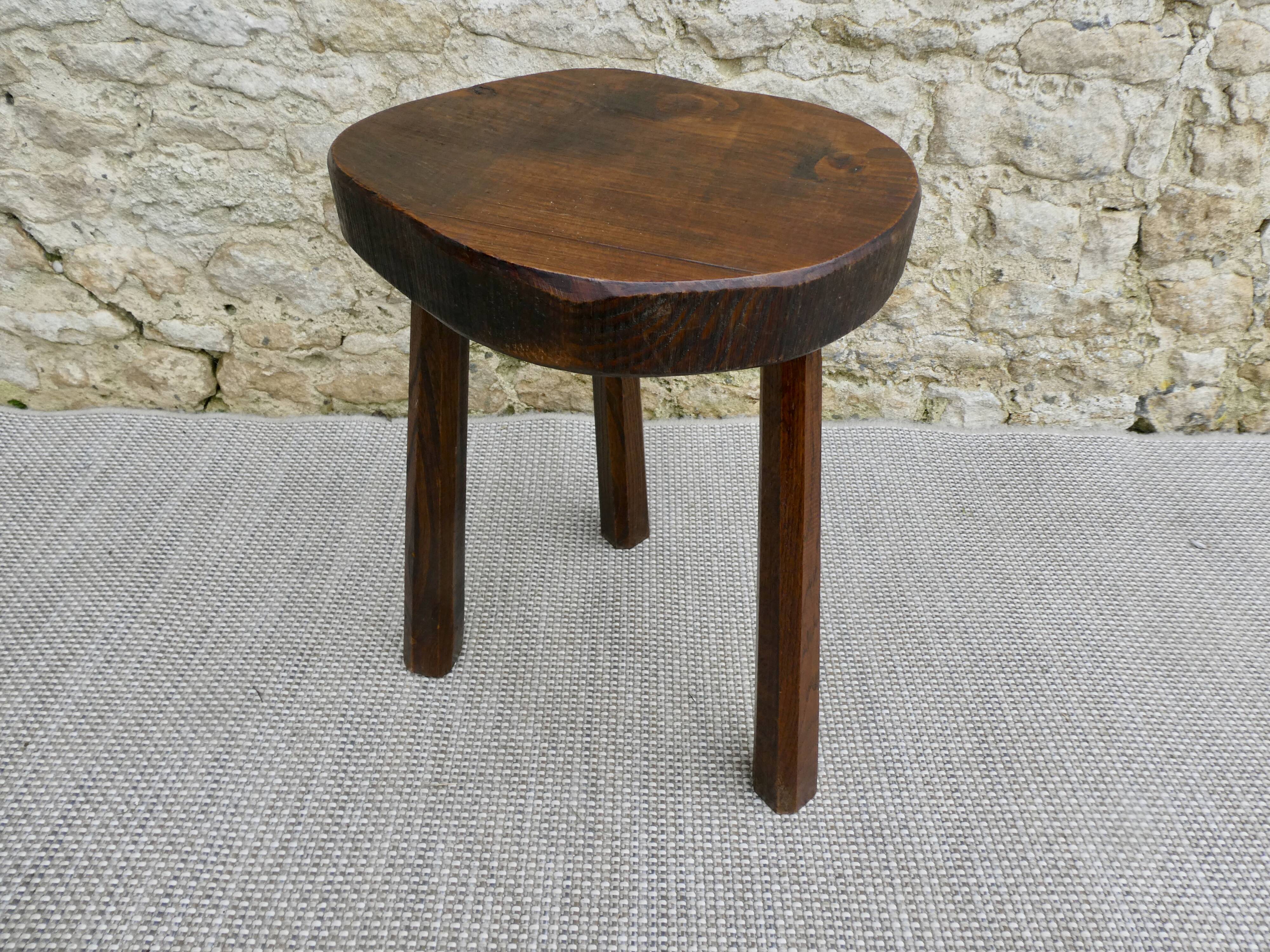Tripod stool in raw wood