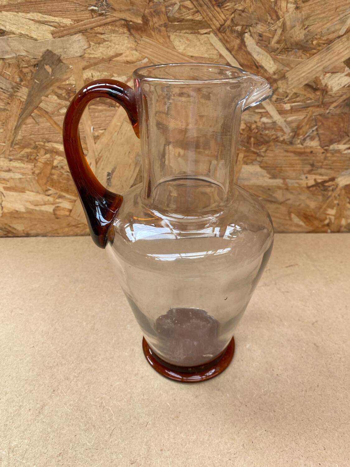 Antique clear blown glass pitcher + orange handle & foot vintage