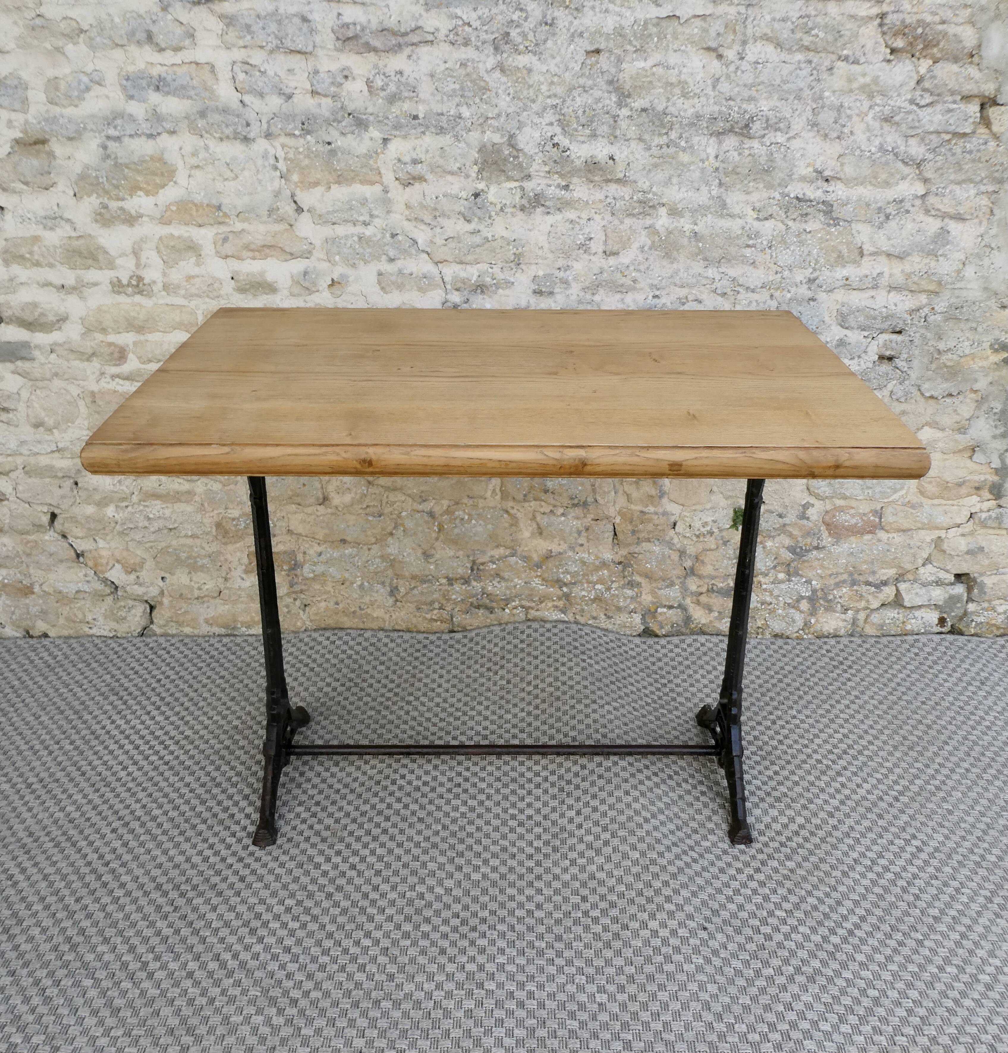 bistro table with cast iron legs signed Lelong, early 20th century