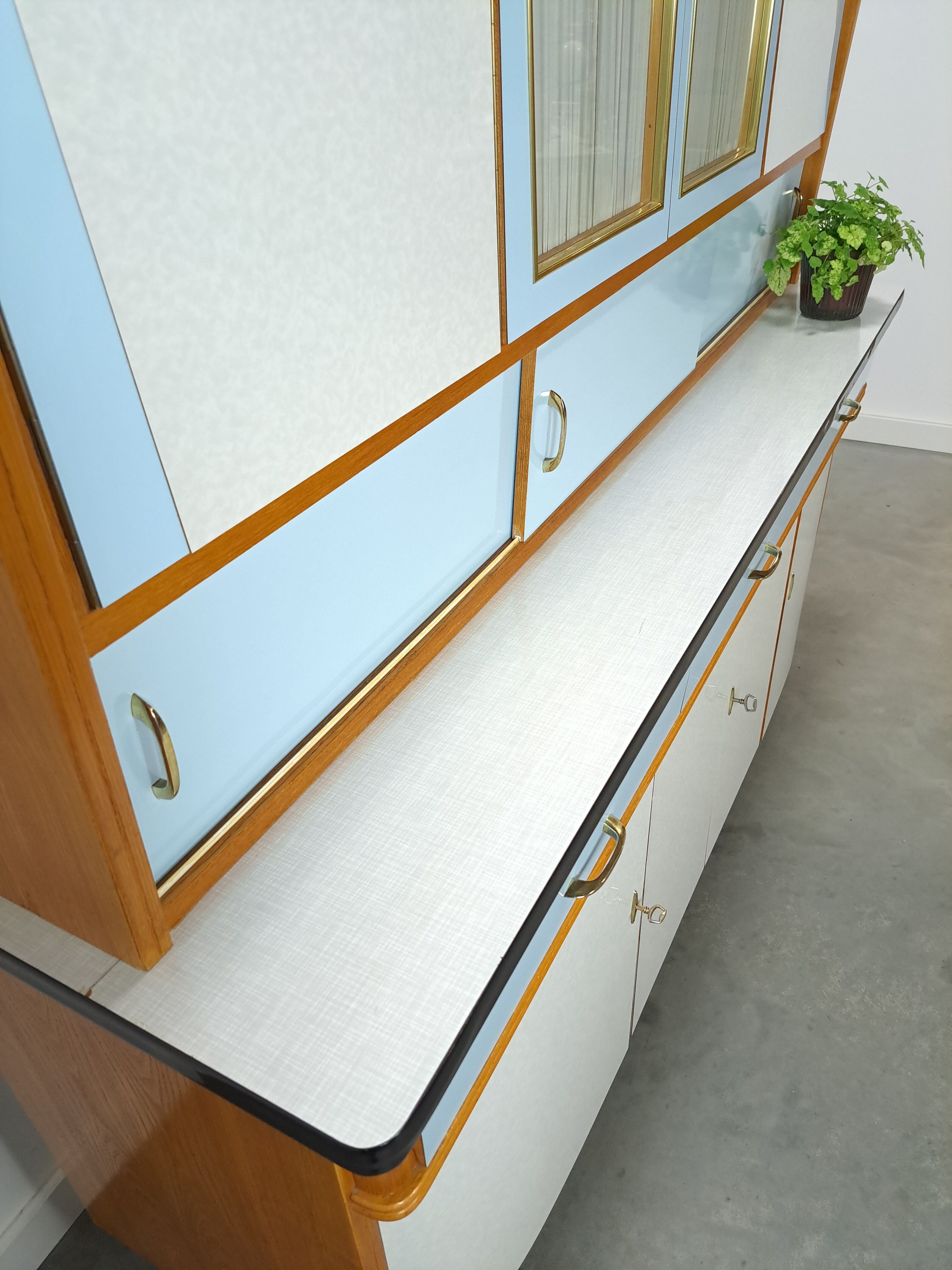 50s vintage kitchen cabinet with brass and formica