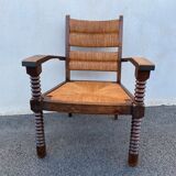 Vintage armchair in straw and brutalist wood