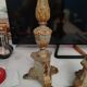 Pair of antique candlesticks in carved wood with acanthus leaf decoration