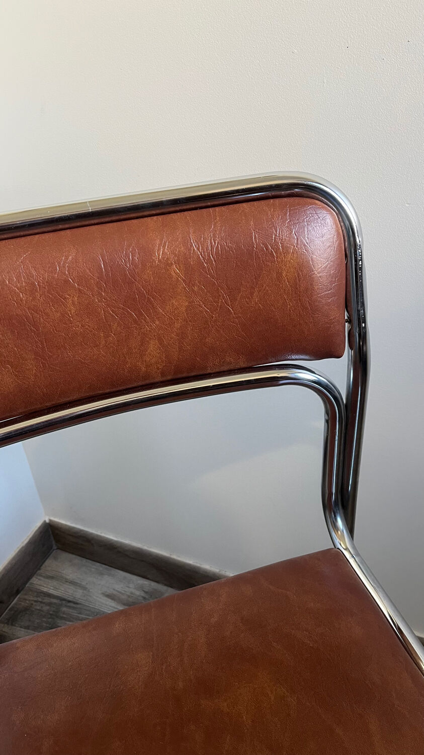 4 chrome chairs in faux leather