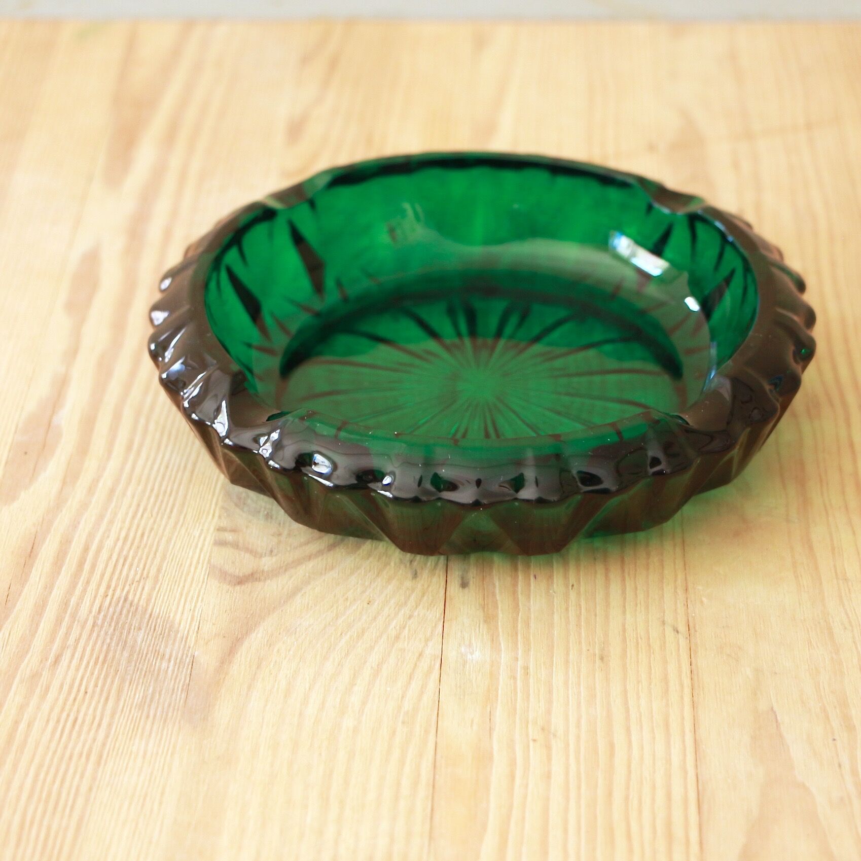 Green glass ashtray