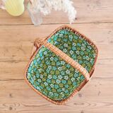 Small old basket with floral fabric interior