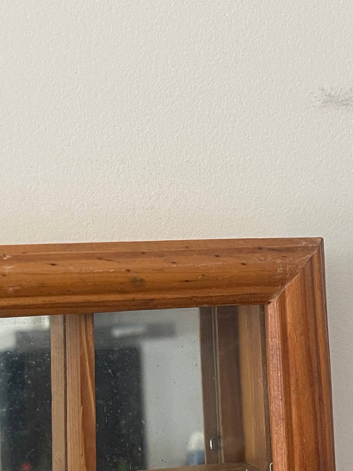 Storage box with wall-mounted glass mirror with integrated storage