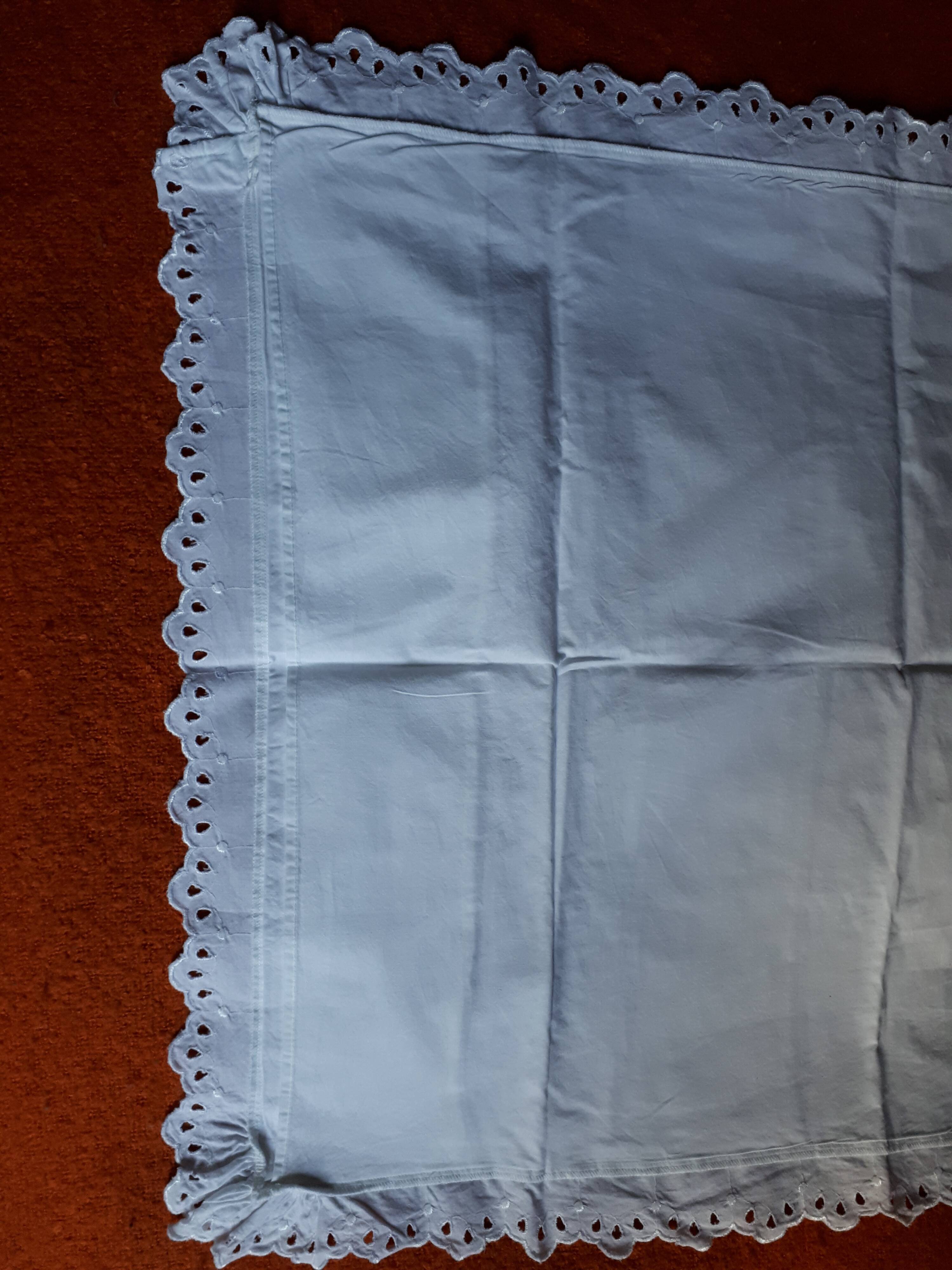 Old pillowcase in white and flying cotton embroidery english