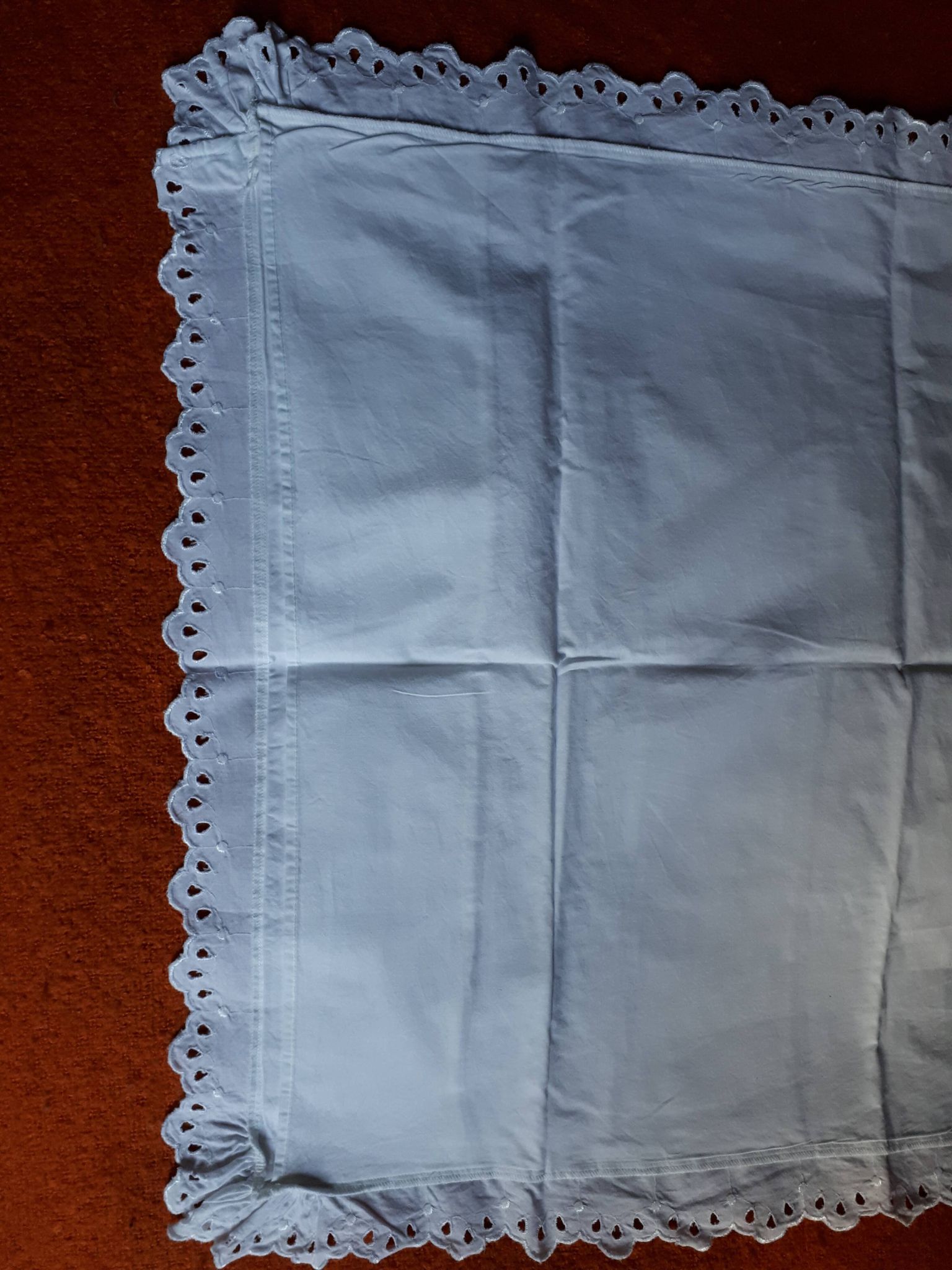 Old pillowcase in white and flying cotton embroidery english