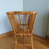 Rattan wicker cradle on wooden wheels