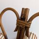 Rattan wall lights by Louis Sognot