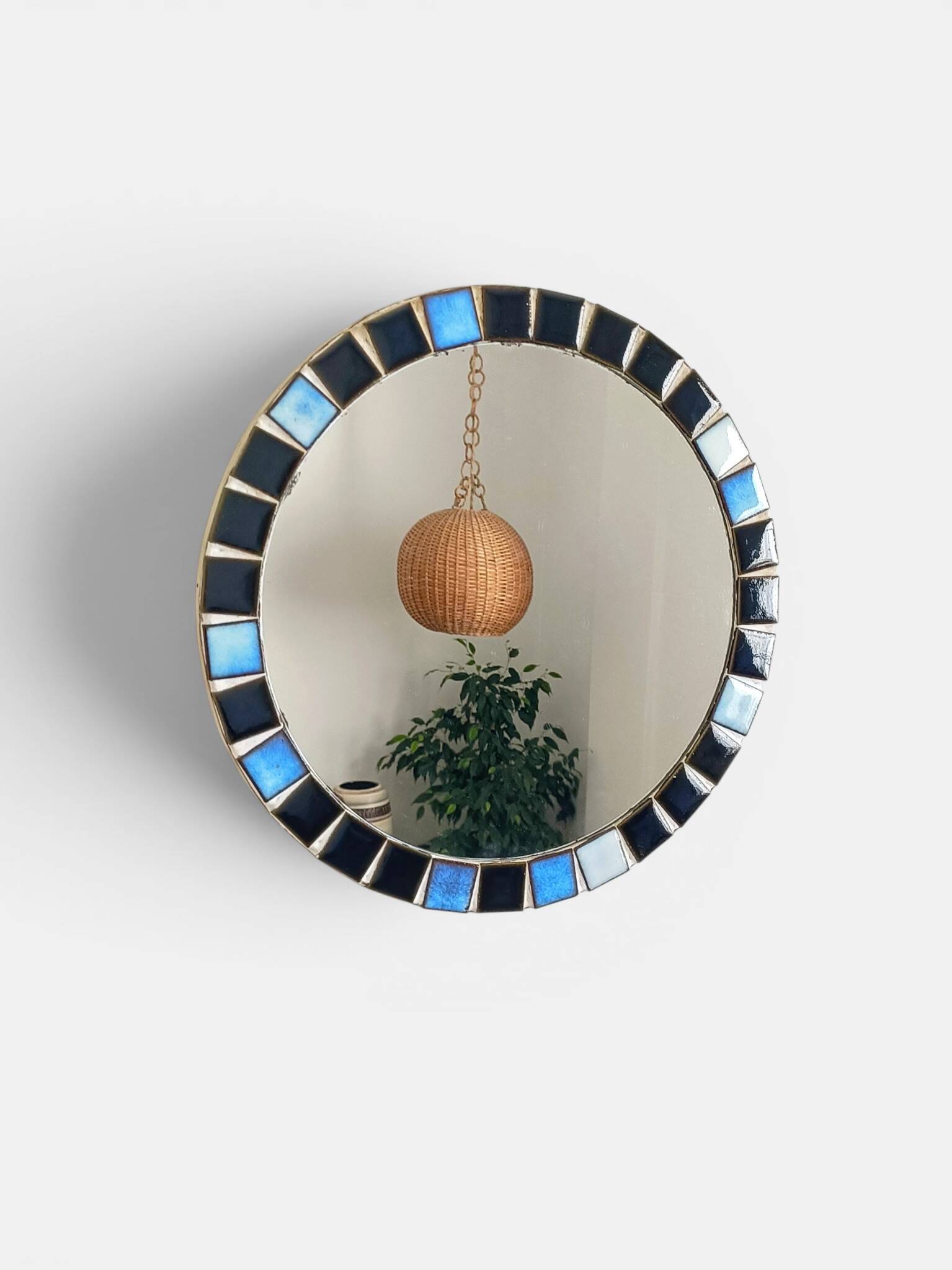 Round mosaic mirror in the style of Vallauris, France circa 1970.
