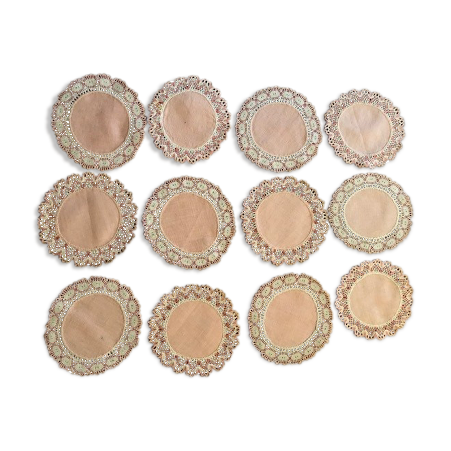 11 pink hand-lace coasters