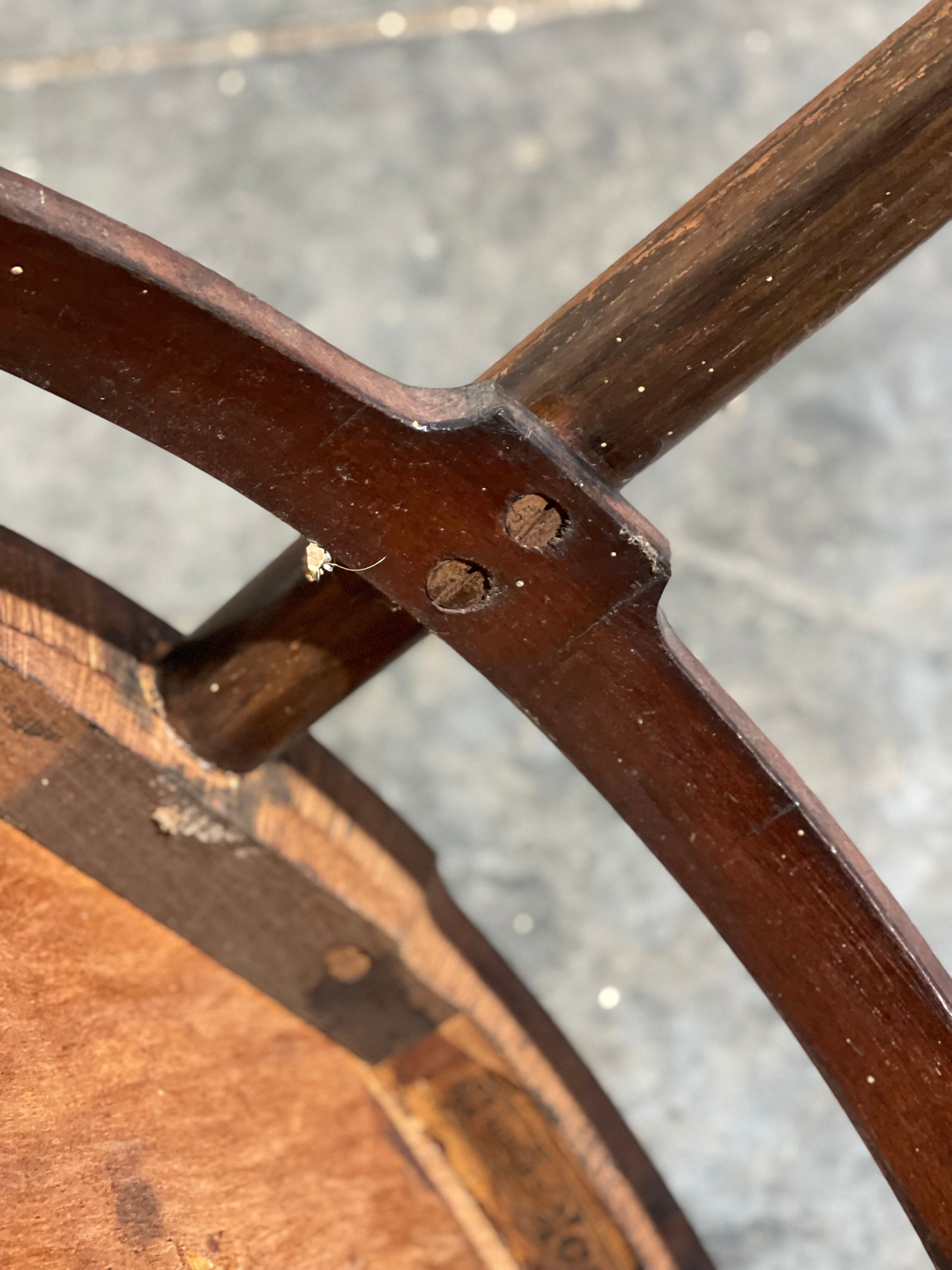 Curved wooden armchair