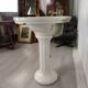 Porcelain sink basin on pedestal