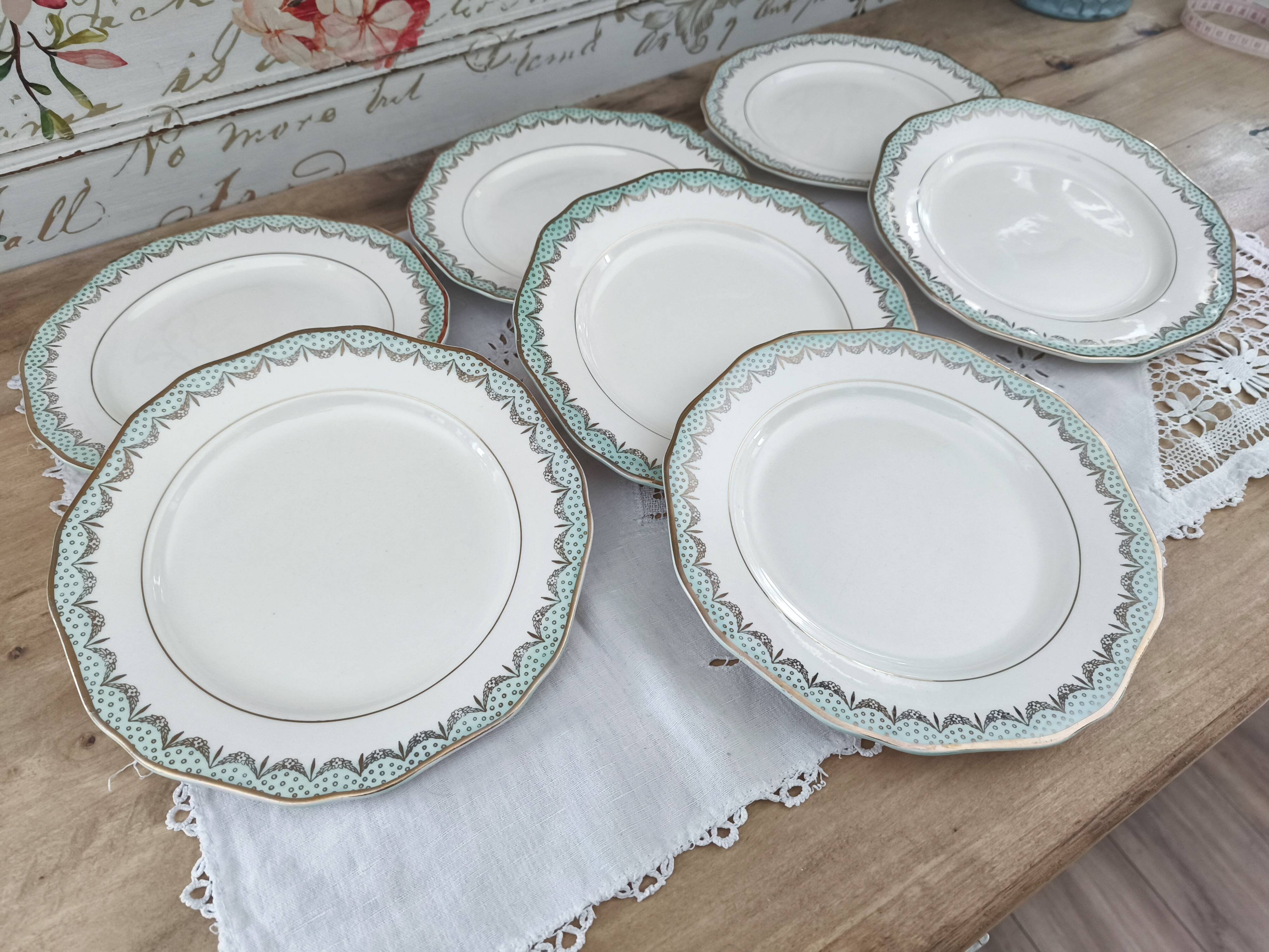 Set of 7 Longwy France earthenware dessert plates, Trianon model