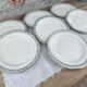 Set of 7 Longwy France earthenware dessert plates, Trianon model