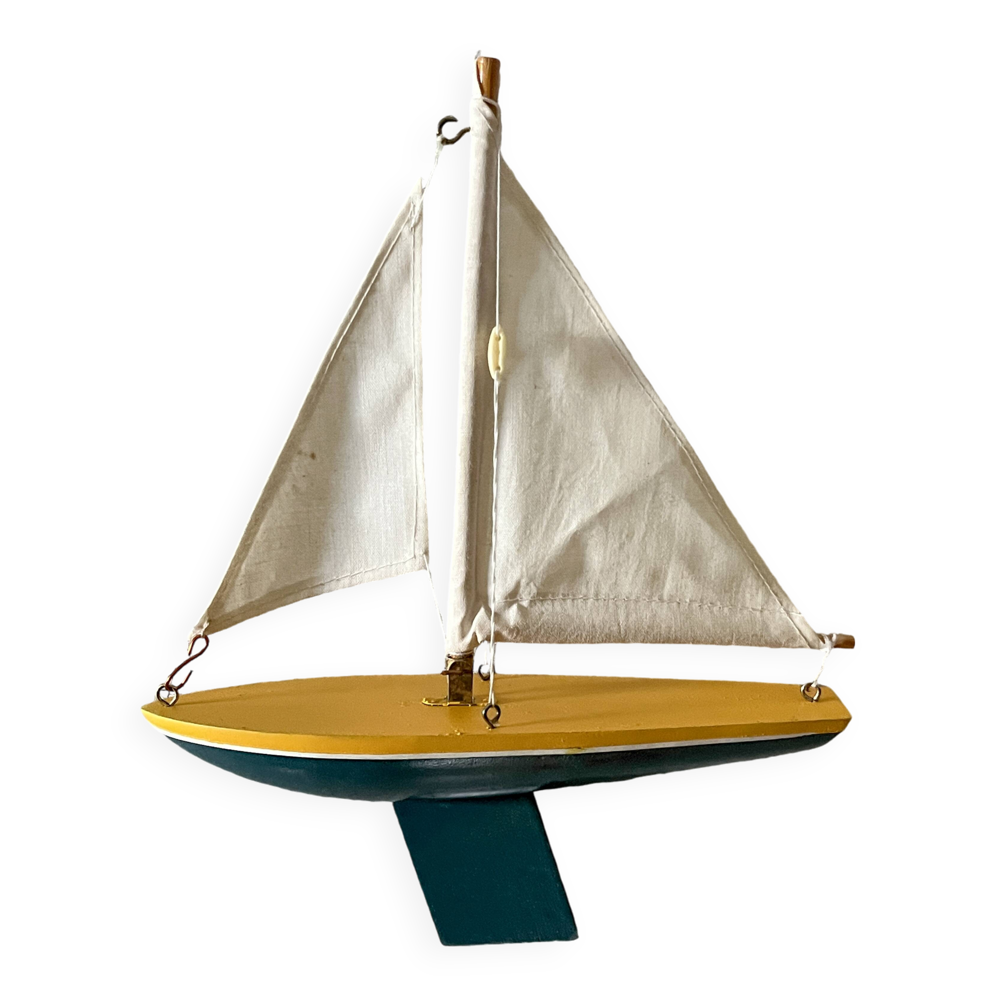 Small wooden sailboat, pretty colors