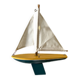 Small wooden sailboat, pretty colors