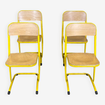 Lot de 4 chaises d'école vintage en bois et acier jaune France