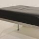 Pair of designer leather and brushed stainless steel footrests - Rob Parry
