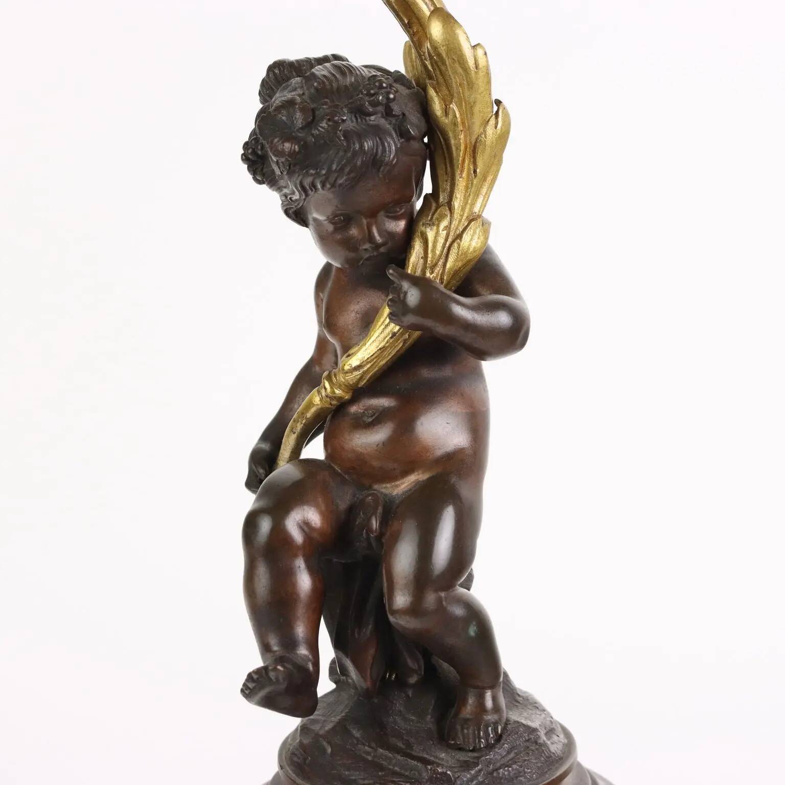 Antique candelabrum in bronze and black marble, Europe, 19th century.