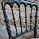 Pair of antique Napoleon III chairs in blackened wood and fabric.