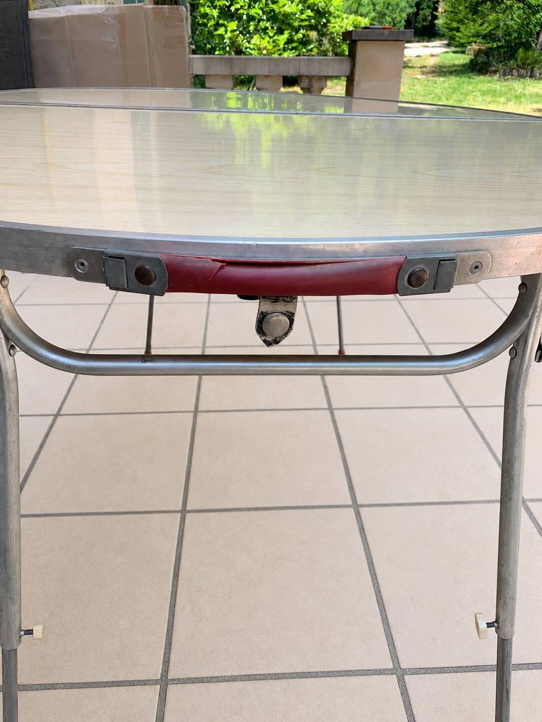 Folding oval table - height adjustable - metal and laminate - 60s/70s.