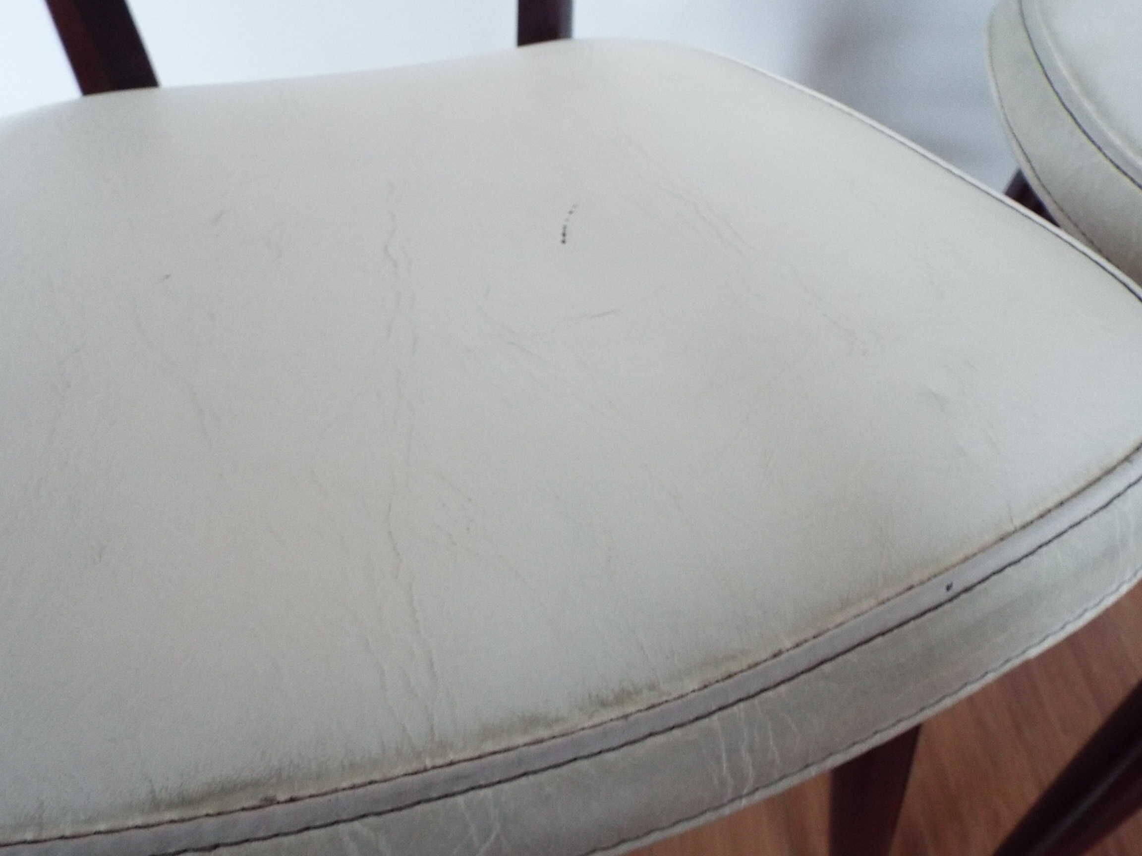 2 skai and wooden chairs