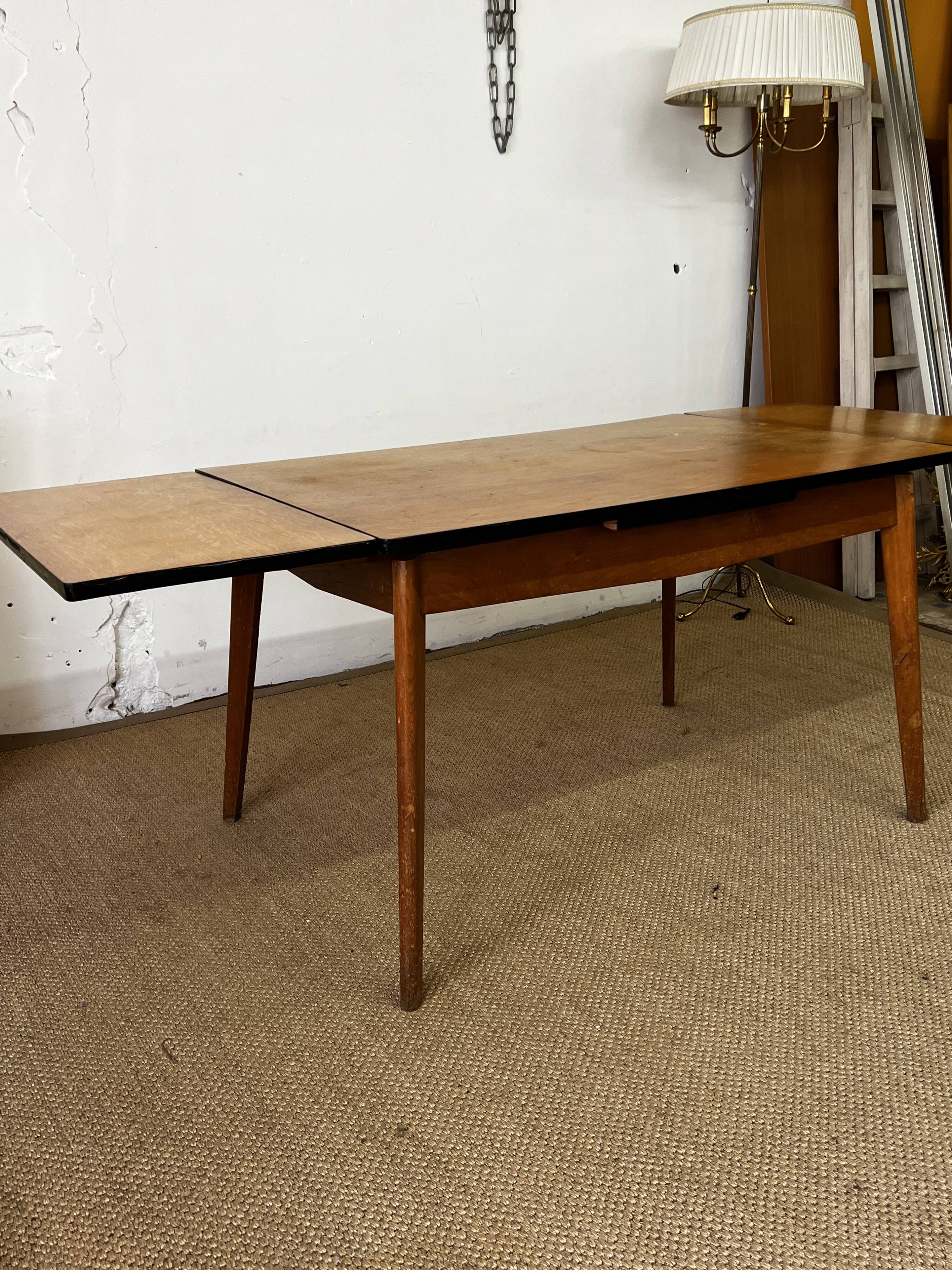 Vintage wooden table with extensions