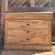 Antique chest of drawers with 4 drawers in raw solid wood.