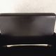 Vintage armchair in skai and black metal 60s