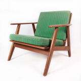 Easy chair in teak and with green upholstery of Danish design, 1960s